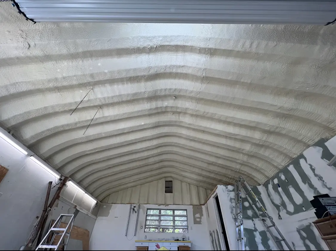Spray polyurethane foam applied to the underside of a metal roof deck in West Ocean City